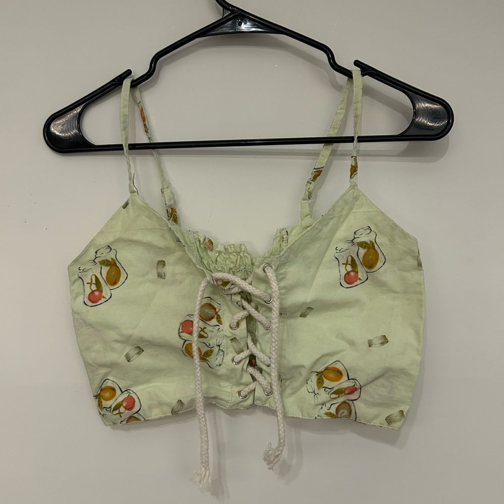 Cropped lace up top with fruit pattern